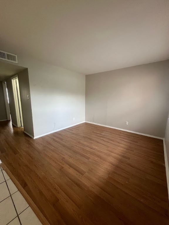 307 East 31st Street, Unit 208 Austin, TX 78705 - Photo 3 of 25 a view of empty room with wooden floor