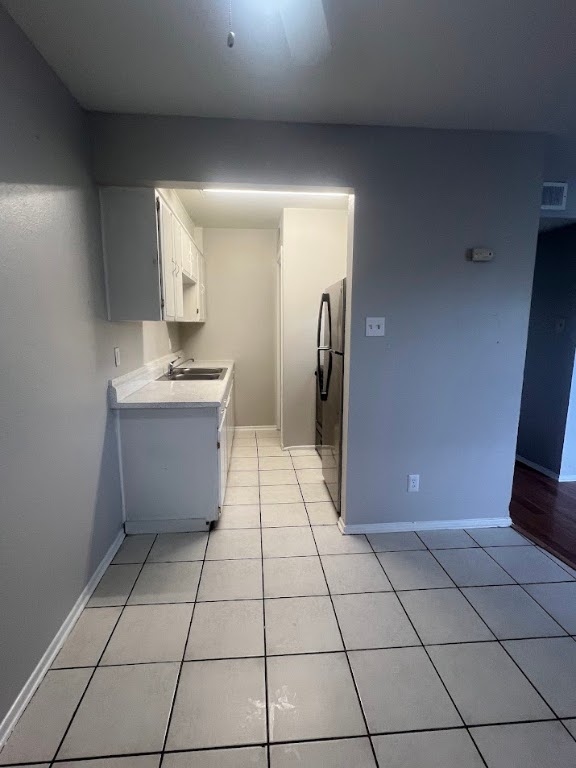 307 East 31st Street, Unit 208 Austin, TX 78705 - Photo 6 of 25 a view of a refrigerator and window in a room