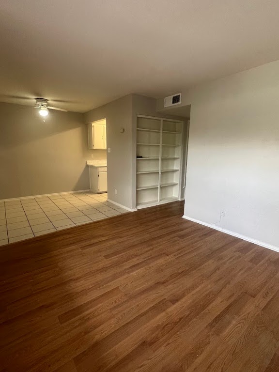 307 East 31st Street, Unit 208 Austin, TX 78705 - Photo 10 of 25 a view of empty room with wooden floor