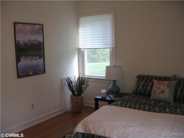 11238 Hanover Courthouse Road Mechanicsville, VA 23116 - Photo 7 of 12 a living room with furniture and a window