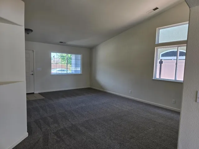 an empty room with windows
