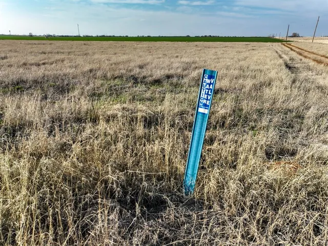 a view of a lake from a mountain