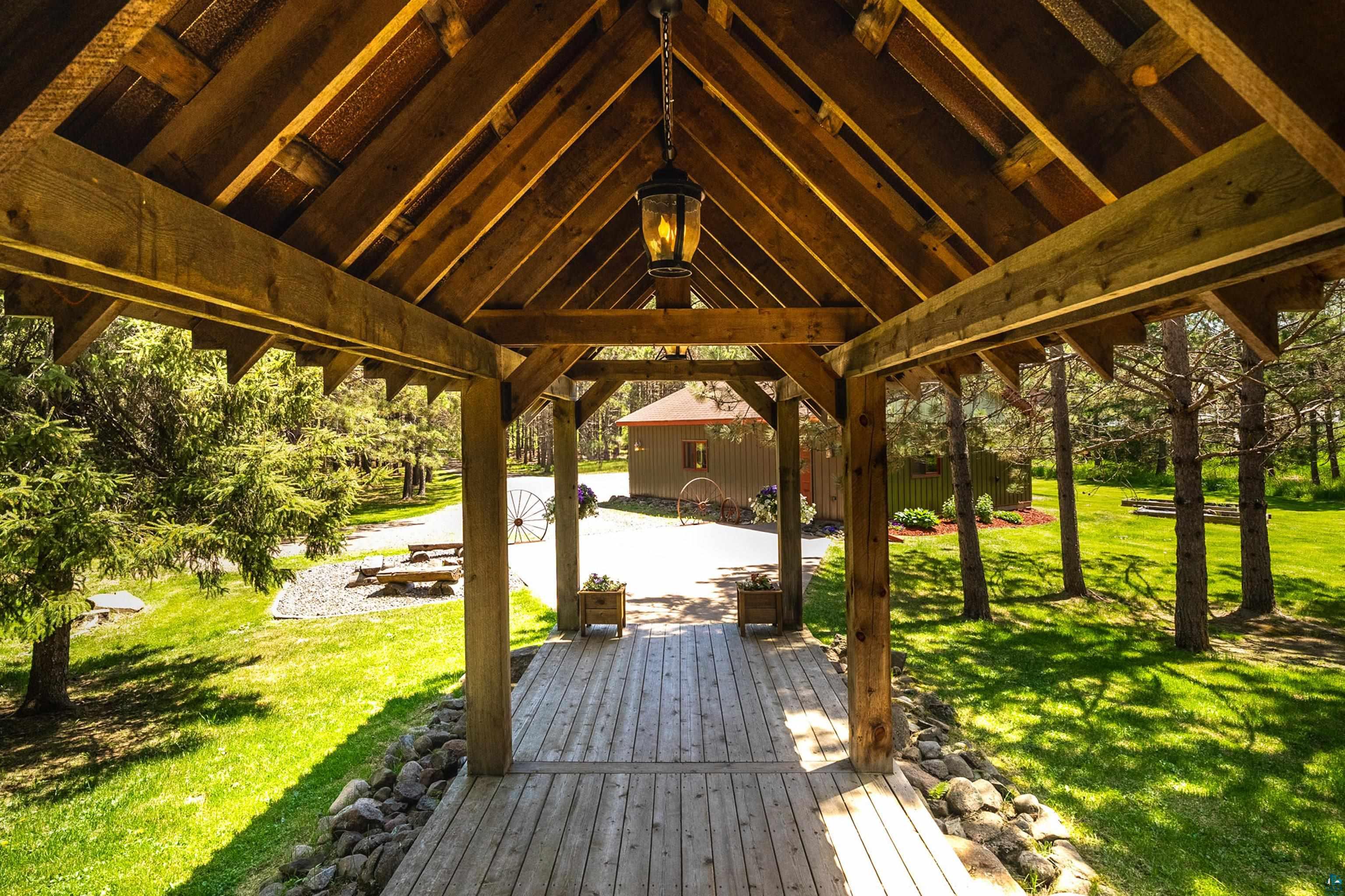 75 East Stark Road Esko, MN 55733 - Photo 58 of 87 Exposed timber frame porch with wood-finish decking