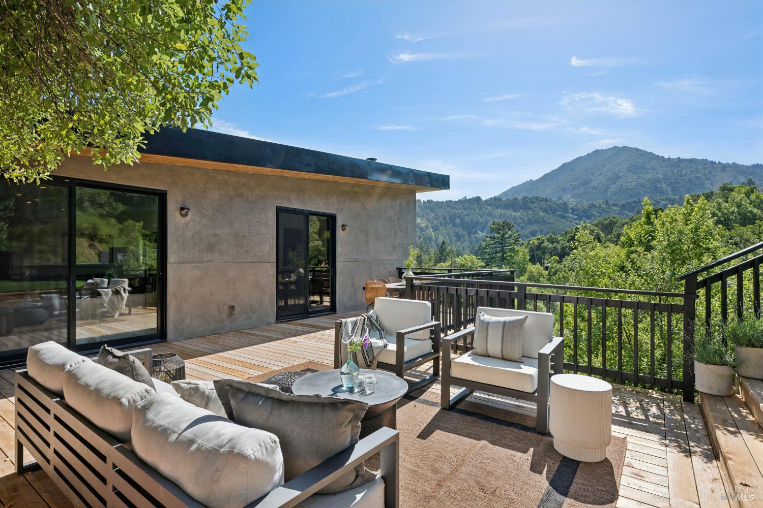 56 Millard Road Larkspur, CA 94939 - Photo 62 of 74 a view of a patio with couches table and chairs and potted plants