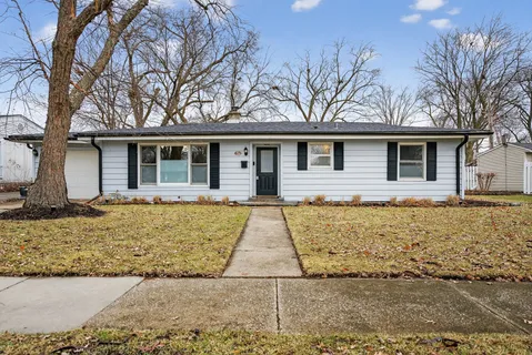 front view of a house with a yard