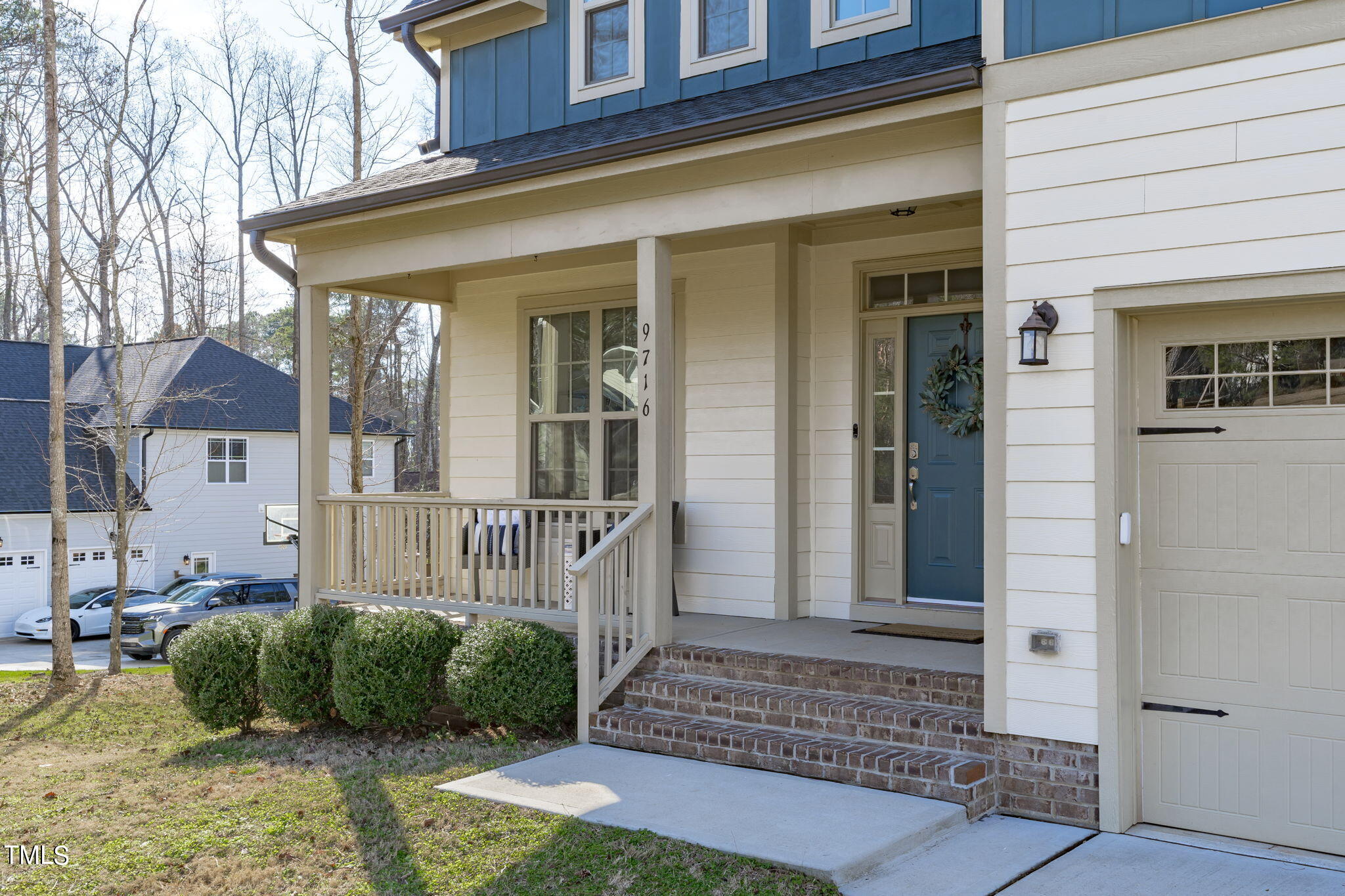 9716 Chris Drive Raleigh, NC 27603 - Photo 2 of 41 Covered rocking chair porch