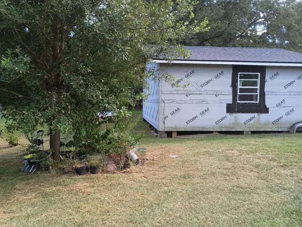 0 Standard Oil Road Shreveport, LA 71108 - Photo 7 of 12 a view of a barn in the patio with a yard