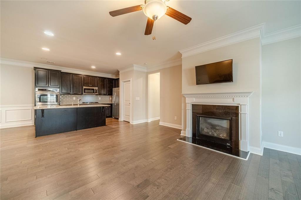 347 Villa Park Circle Stone Mountain, GA 30087 - Photo 7 of 25 a view of kitchen with microwave and stove top oven