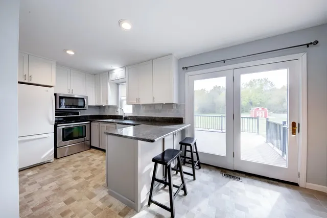 $365,000 | 59071 Annah Drive, New Hudson, MI 48165