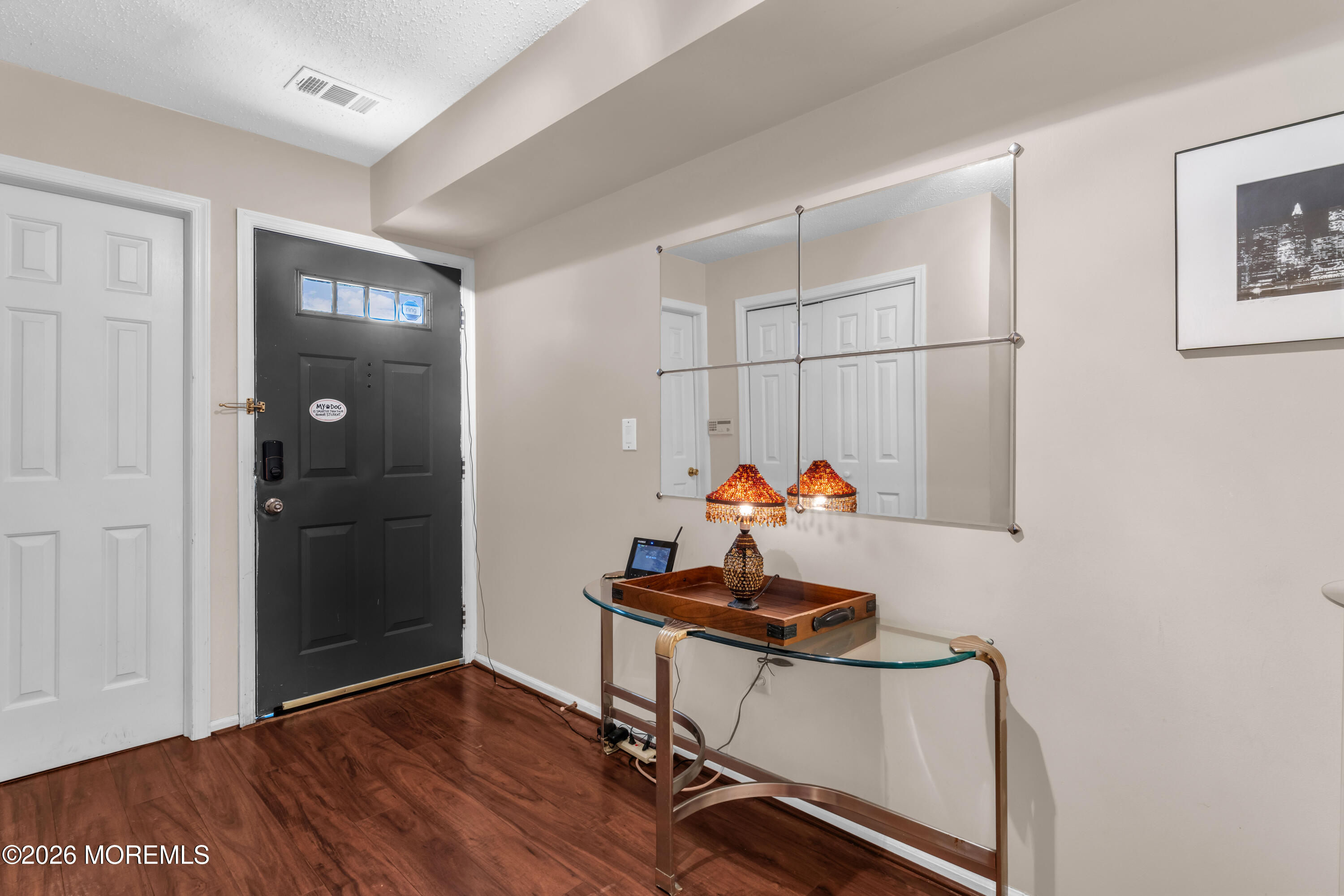 135 1st Street, Unit 1E Keyport, NJ 07735 - Photo 12 of 40 a view of a workspace with furniture and closet
