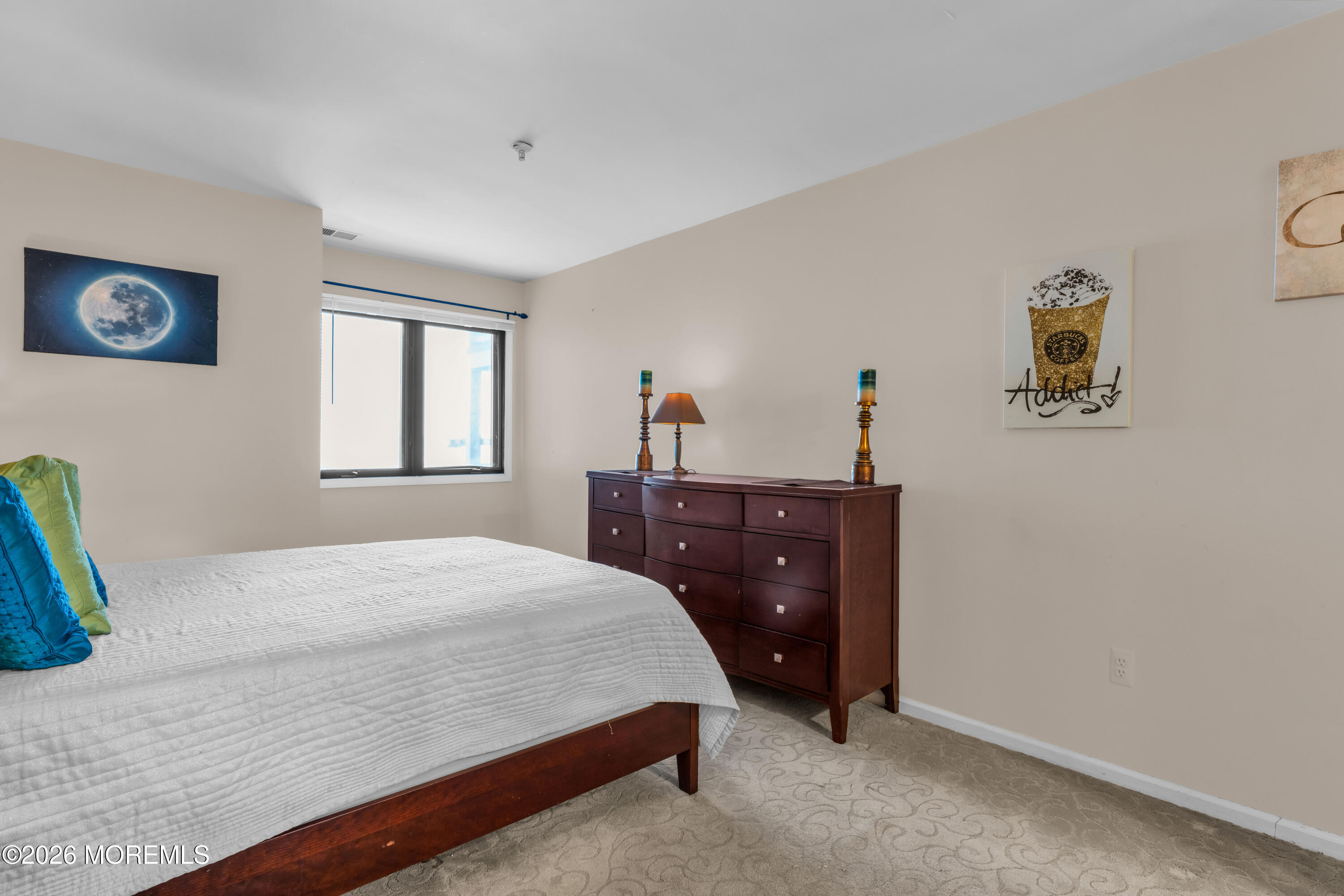 135 1st Street, Unit 1E Keyport, NJ 07735 - Photo 25 of 40 a bedroom with a bed and a window