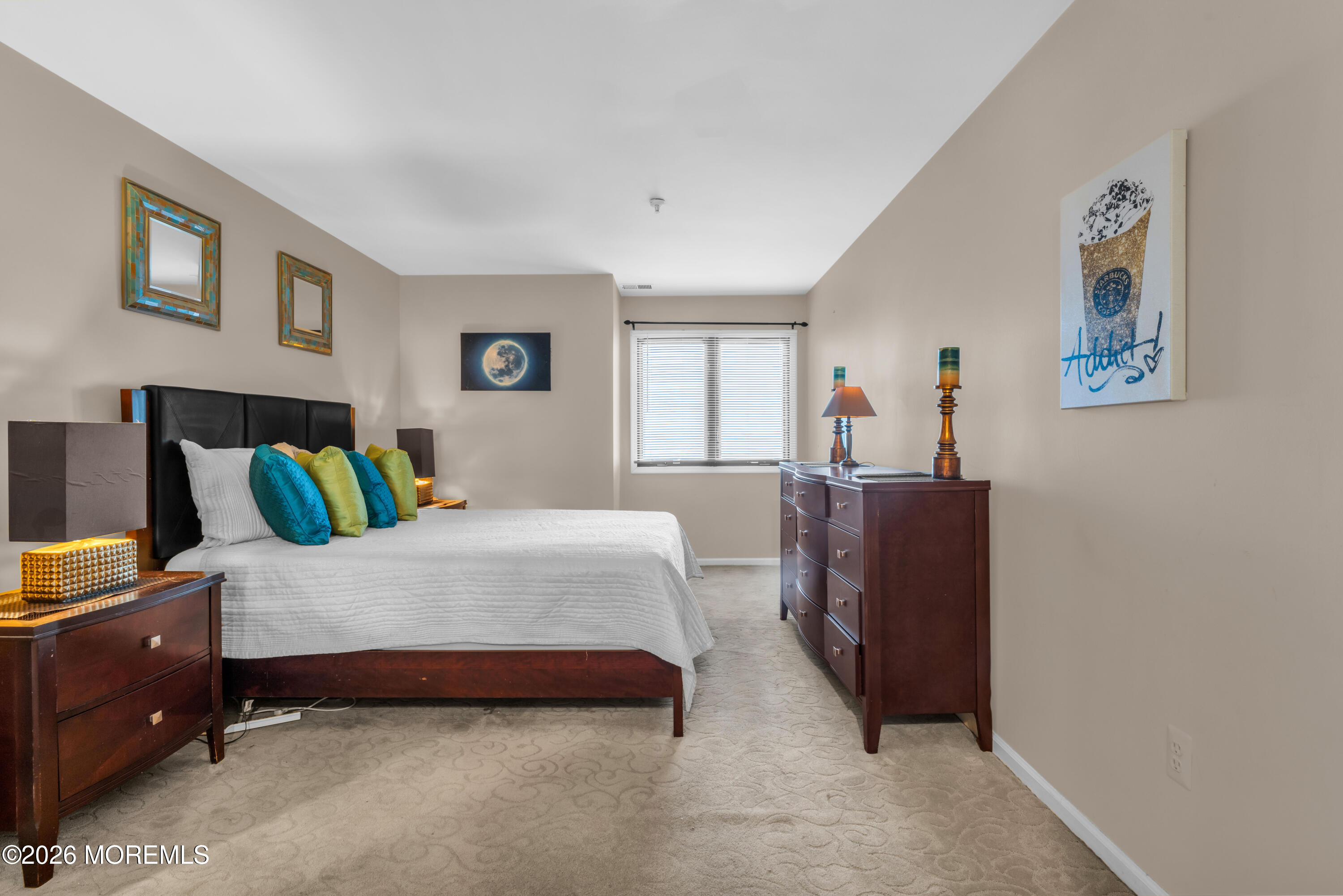 135 1st Street, Unit 1E Keyport, NJ 07735 - Photo 26 of 40 a bedroom with a bed and wooden floor