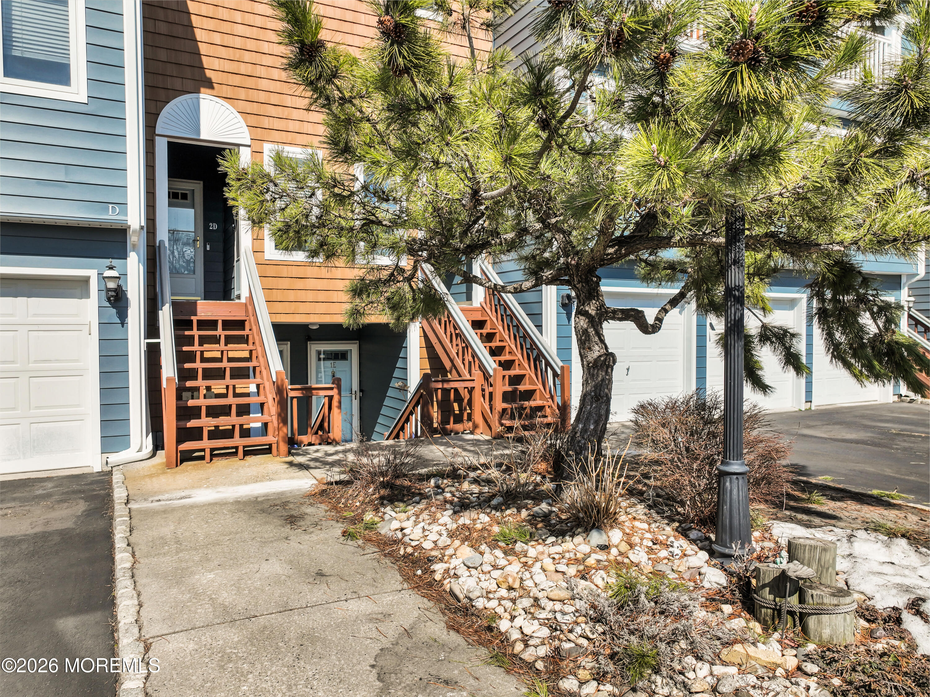 135 1st Street, Unit 1E Keyport, NJ 07735 - Photo 31 of 40 a front view of a building with an outdoor space