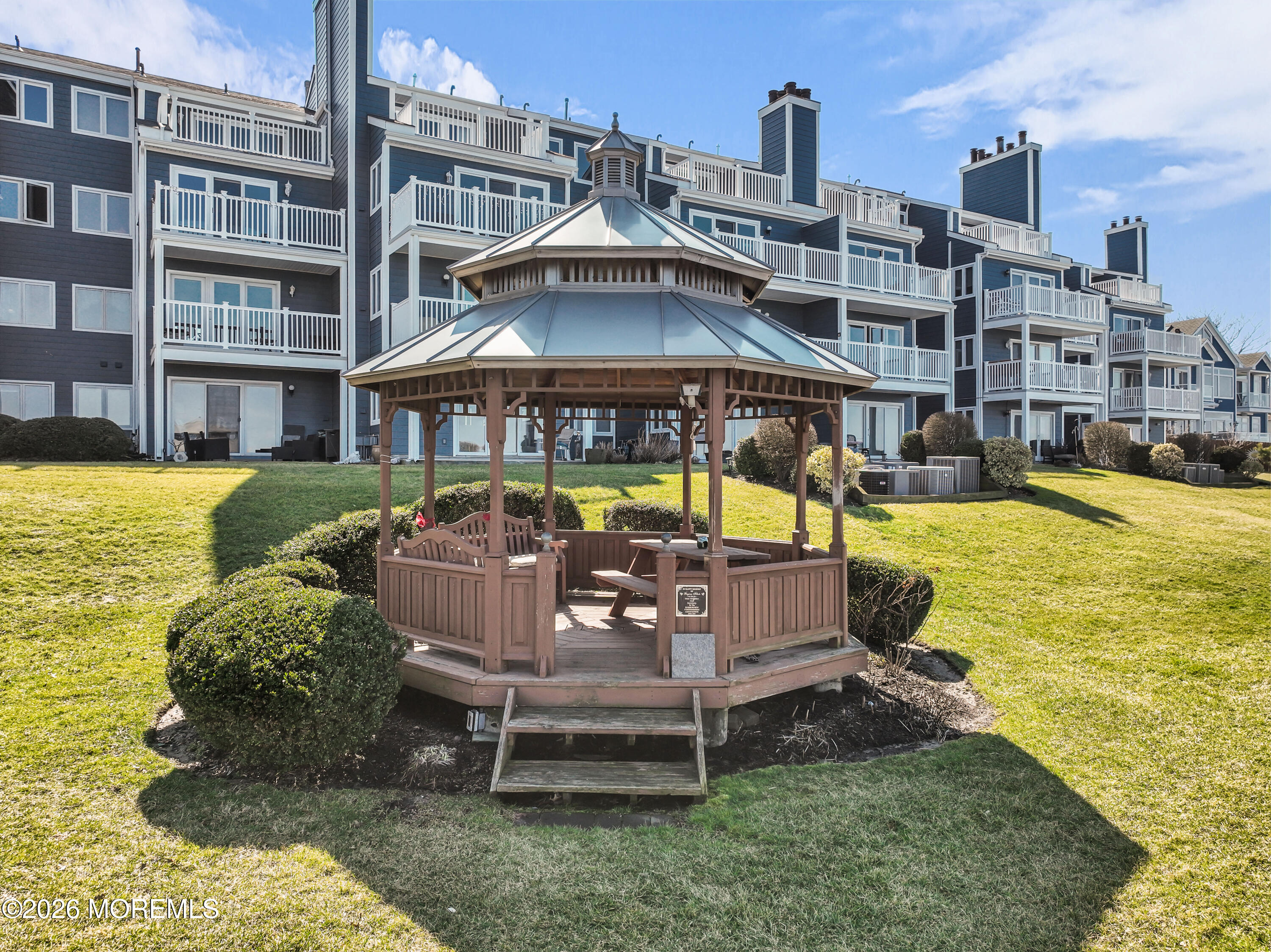 135 1st Street, Unit 1E Keyport, NJ 07735 - Photo 39 of 40 a front view of a house with swimming pool outdoor seating