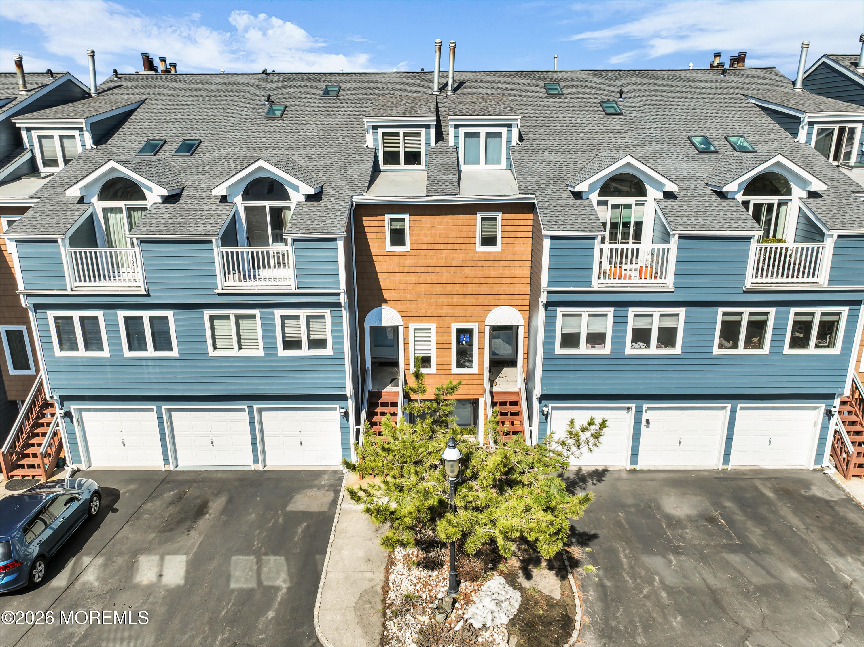 135 1st Street, Unit 1E Keyport, NJ 07735 - Photo 10 of 40 a front view of a house with a yard