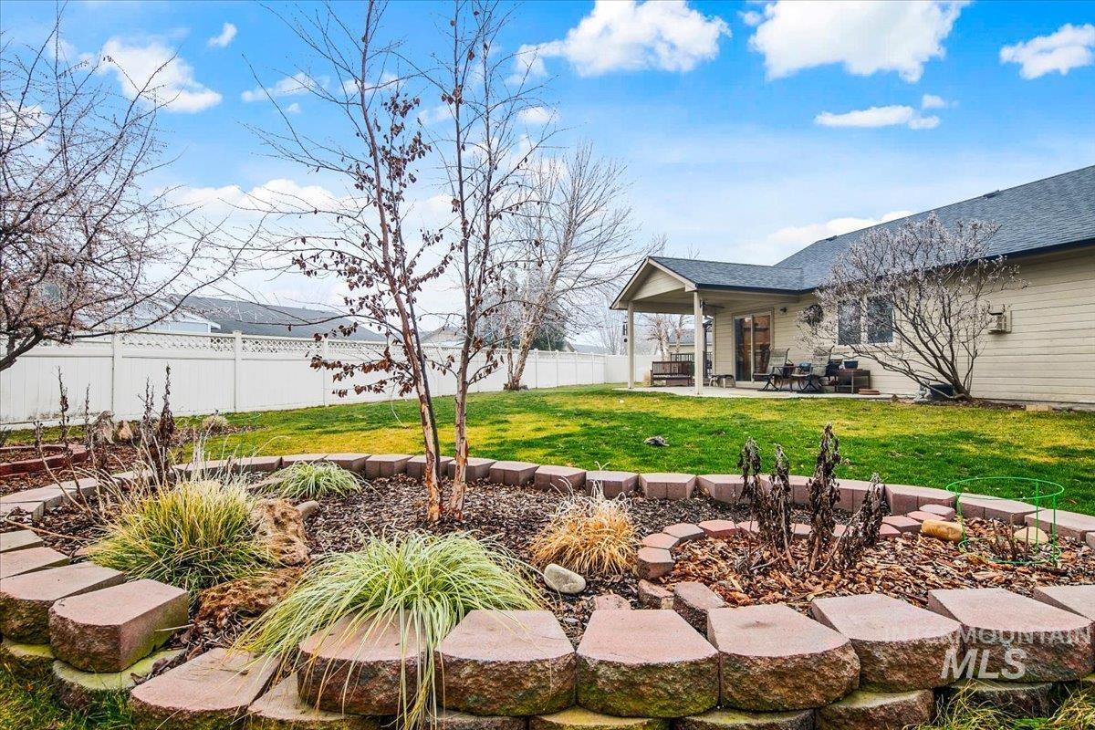 1513 Fairway Street Middleton, ID 83644 - Photo 17 of 20 Fenced backyard with a patio
