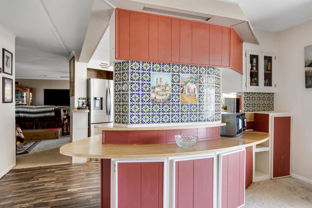 18218 Paradise Mountain Road Valley Center, CA 92082 - Photo 12 of 53 a kitchen with a sink cabinets and appliances