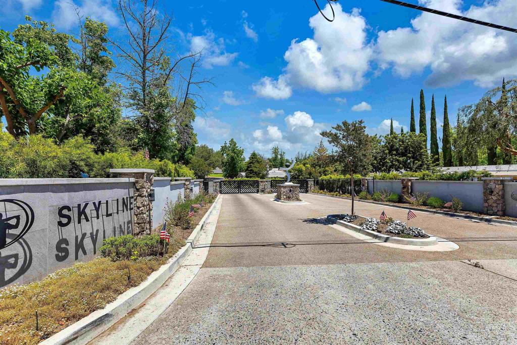 18218 Paradise Mountain Road Valley Center, CA 92082 - Photo 4 of 53 a view of a park with iron fence