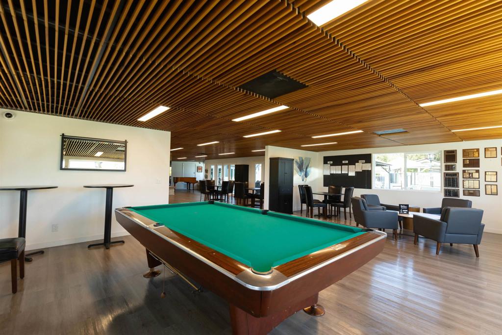 18218 Paradise Mountain Road Valley Center, CA 92082 - Photo 46 of 53 a room with chairs pool table and kitchen view