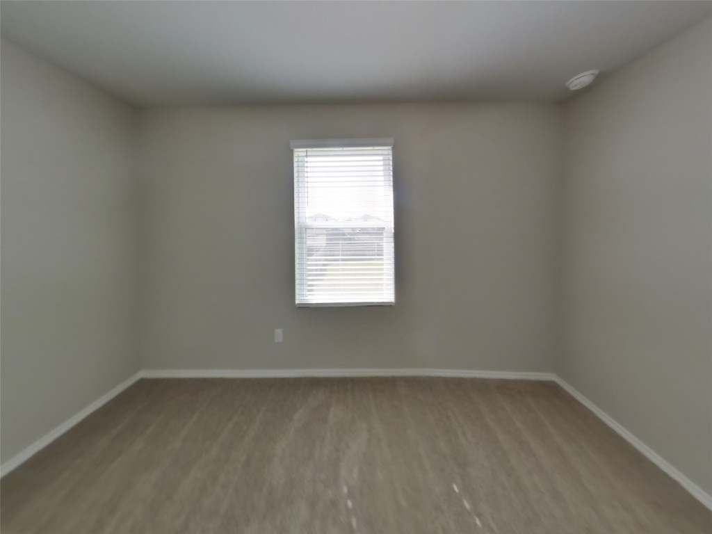 3504 Gooseneck Lane Georgetown, TX 78626 - Photo 11 of 27 an empty room with a window