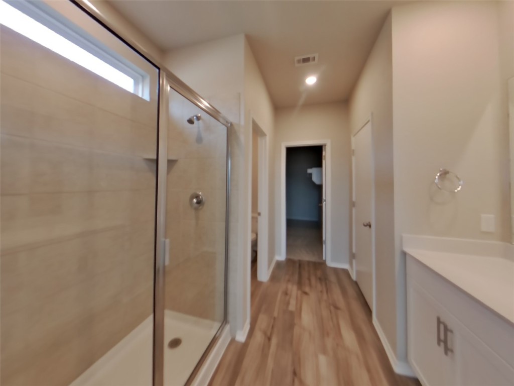 3504 Gooseneck Lane Georgetown, TX 78626 - Photo 8 of 27 a bathroom with a bathtub and a shower