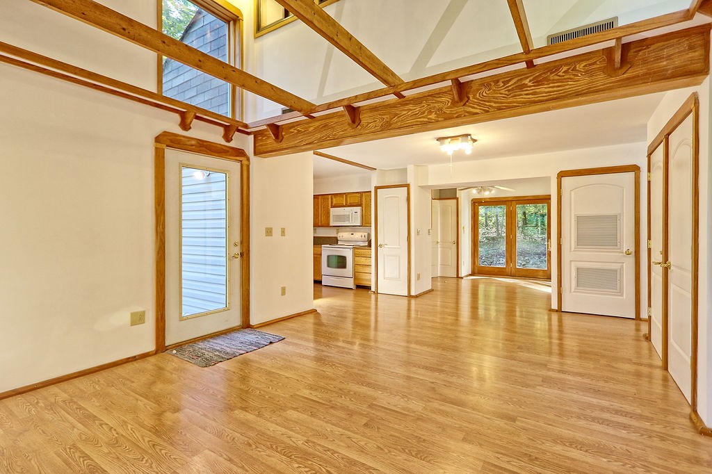 1053 Sam Johnson Road Columbia, TN 38401 - Photo 11 of 53 a view of an empty room with wooden floor and windows