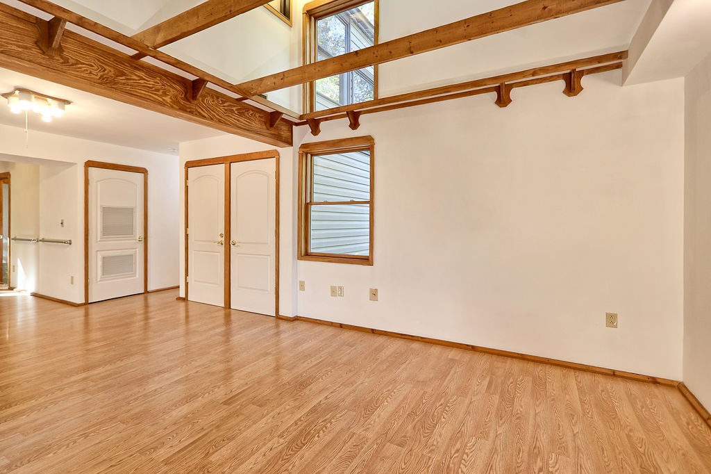 1053 Sam Johnson Road Columbia, TN 38401 - Photo 12 of 53 a view of an empty room with a window and wooden floor
