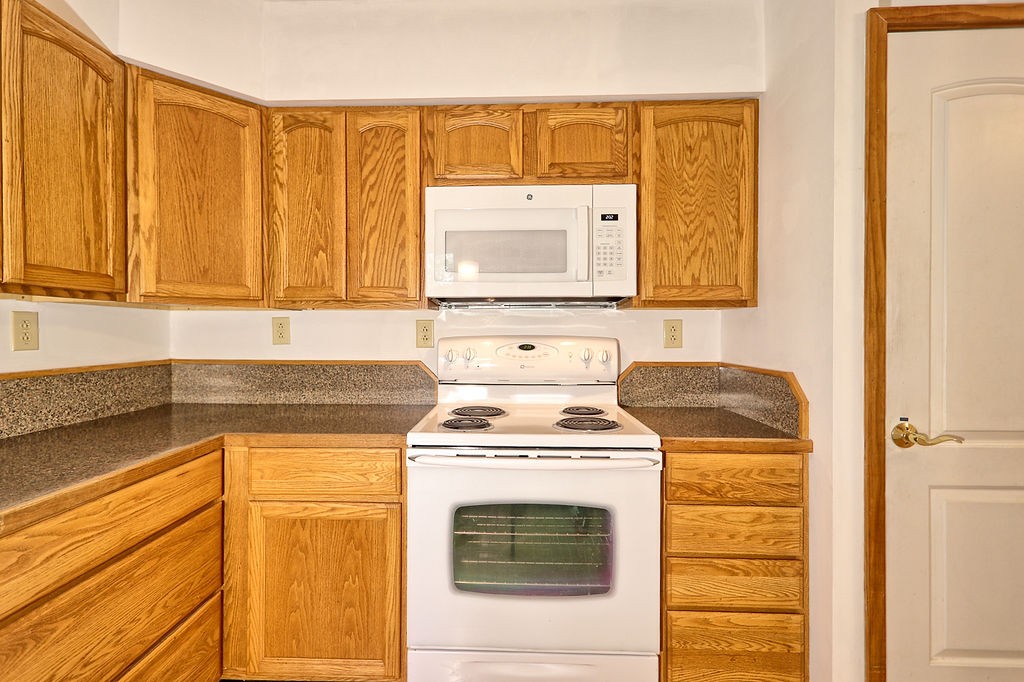 1053 Sam Johnson Road Columbia, TN 38401 - Photo 18 of 53 a kitchen with a stove top oven