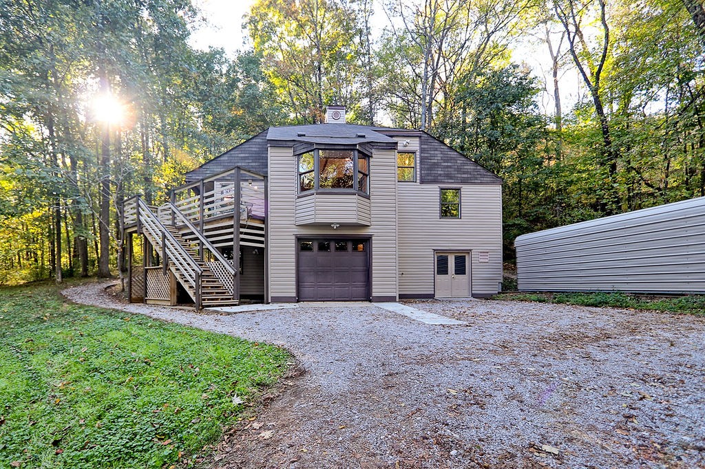 1053 Sam Johnson Road Columbia, TN 38401 - Photo 2 of 53 a view of a house with a yard and a tree