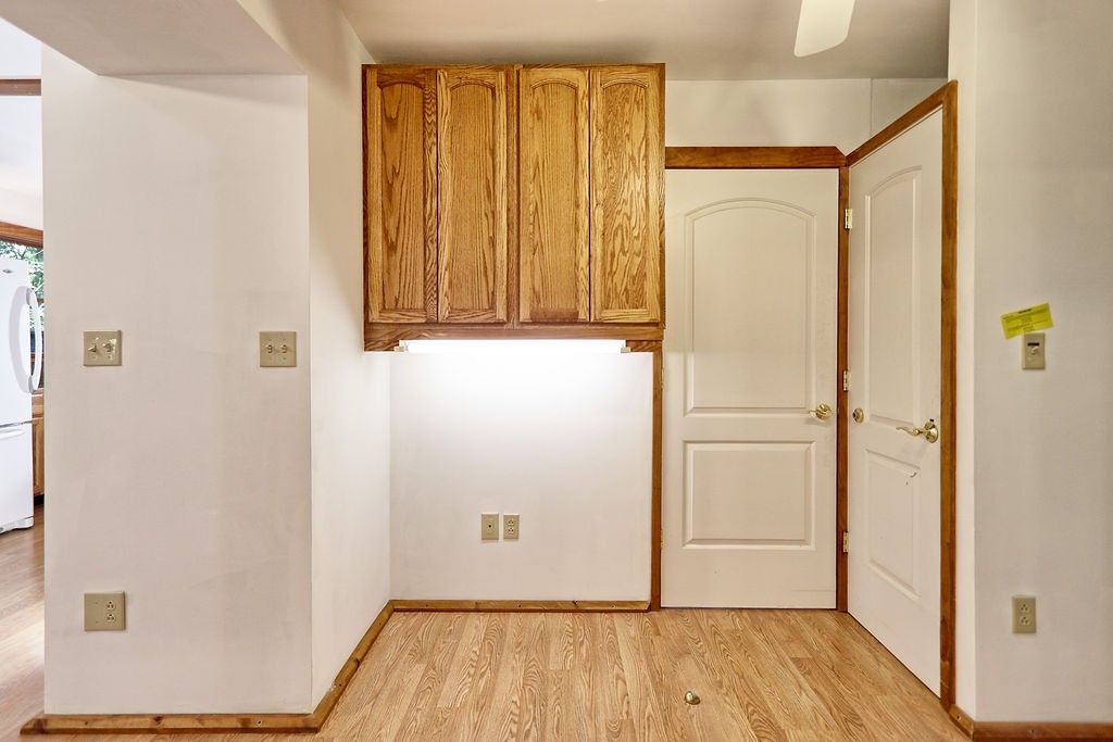 1053 Sam Johnson Road Columbia, TN 38401 - Photo 24 of 53 a view of a hallway with wooden floor and closet