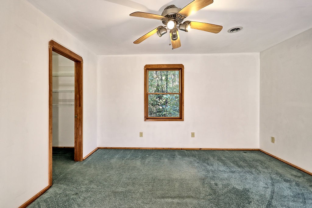 1053 Sam Johnson Road Columbia, TN 38401 - Photo 35 of 53 an empty room with windows and fan