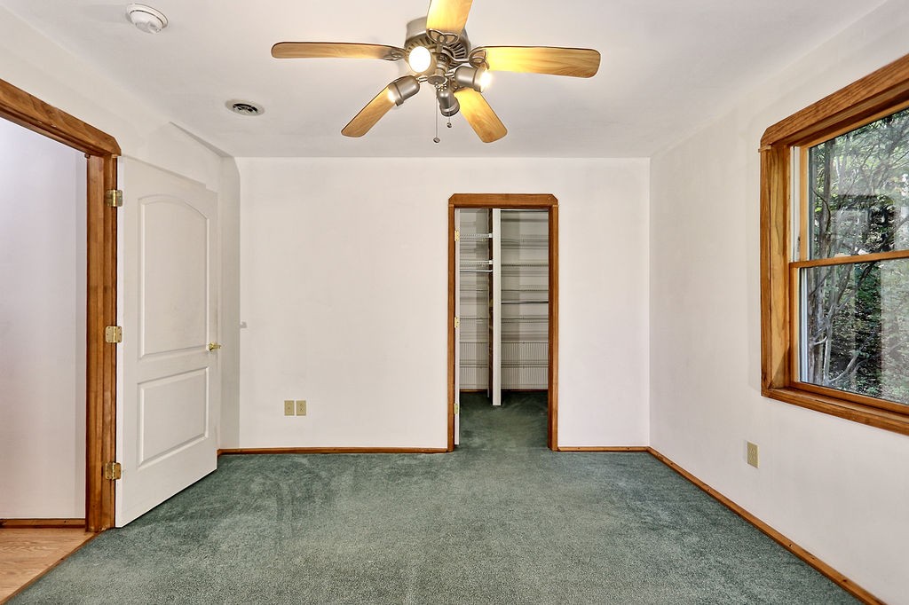 1053 Sam Johnson Road Columbia, TN 38401 - Photo 37 of 53 an empty room with windows and fan
