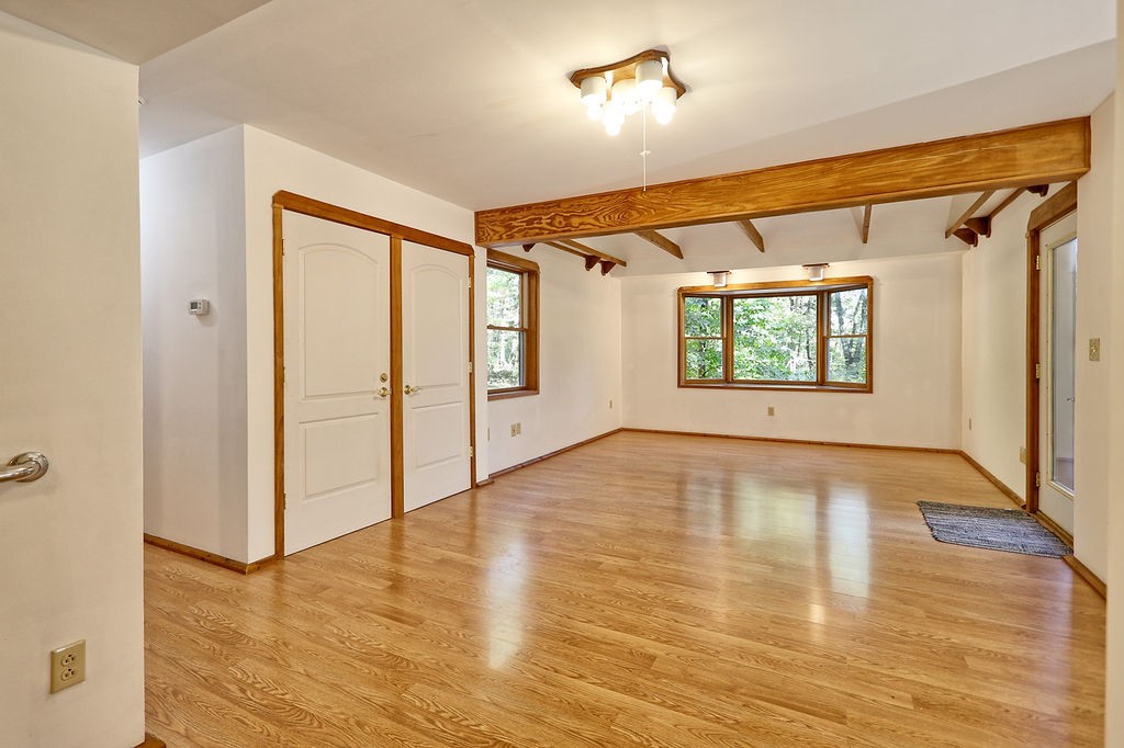 1053 Sam Johnson Road Columbia, TN 38401 - Photo 38 of 53 a view of an empty room with wooden floor and a window