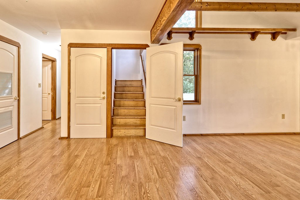 1053 Sam Johnson Road Columbia, TN 38401 - Photo 39 of 53 a view of an empty room with wooden floor and a window