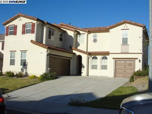 2934 Pilar Ridge Drive Bay Point, CA 94565 - Photo 1 of 1 a front view of a house with a yard