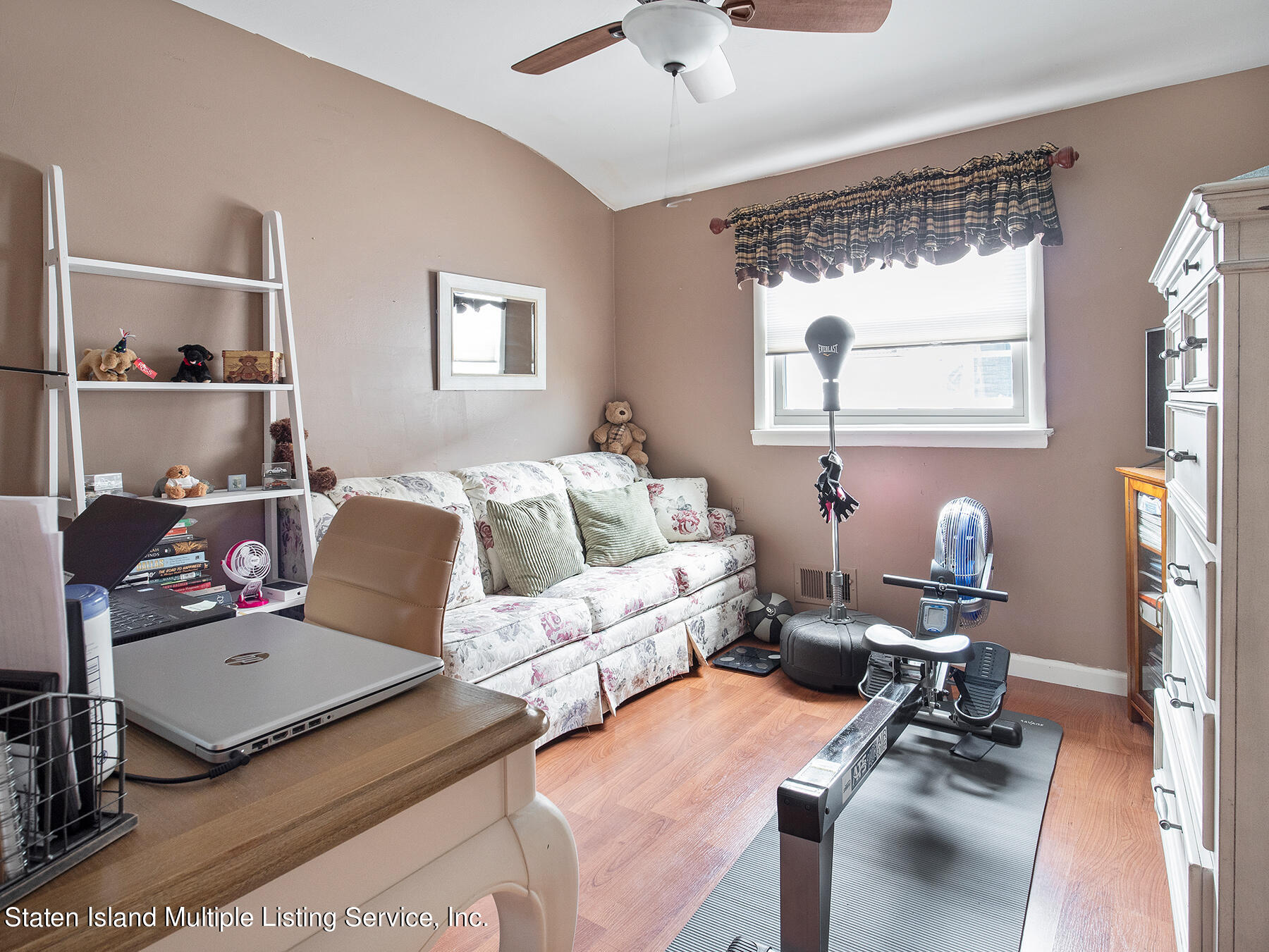 84 Stack Drive Staten Island, NY 10312 - Photo 20 of 29 a living room with furniture and a window