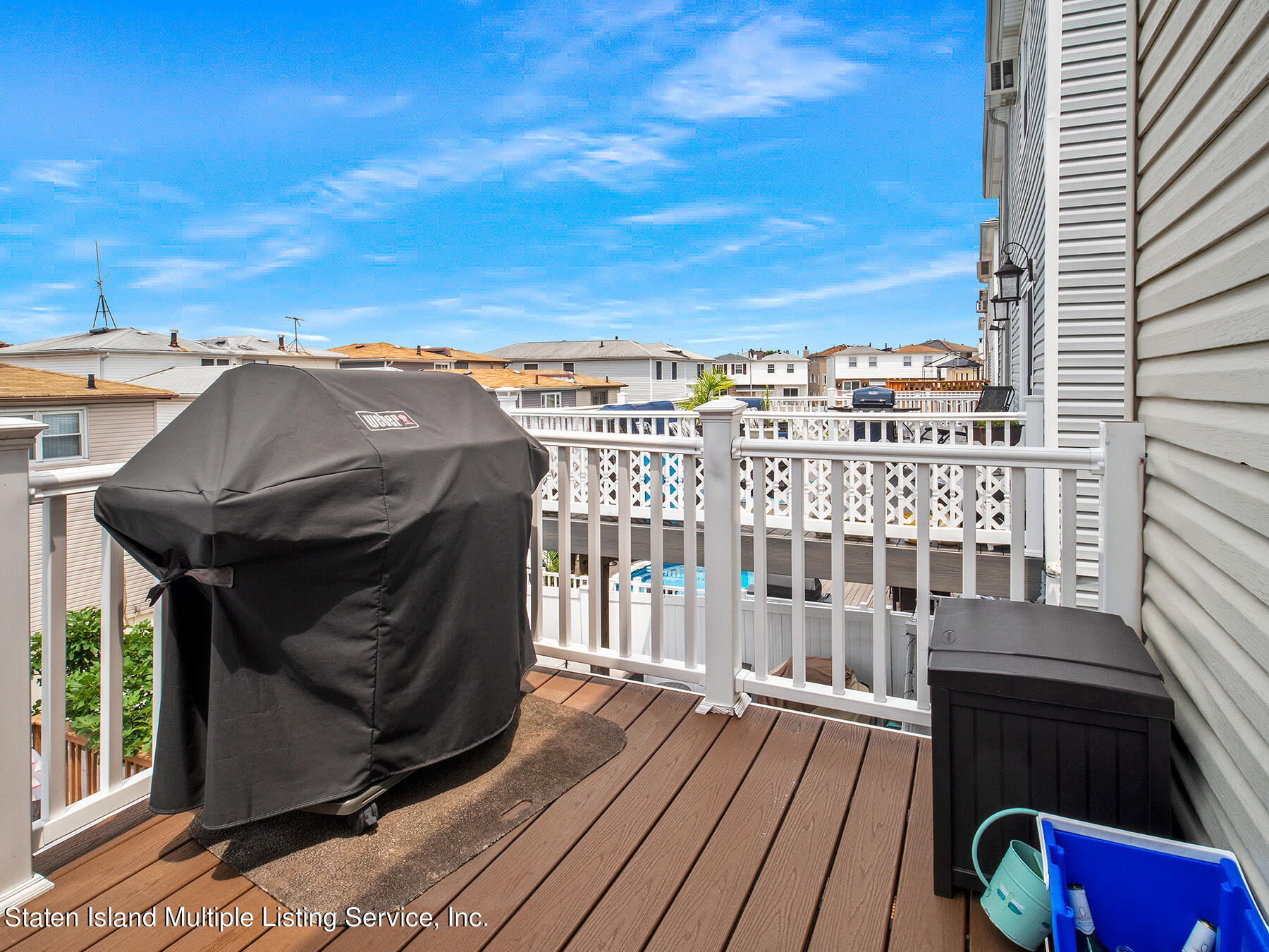 84 Stack Drive Staten Island, NY 10312 - Photo 26 of 29 a view of a balcony with wooden floor and city view