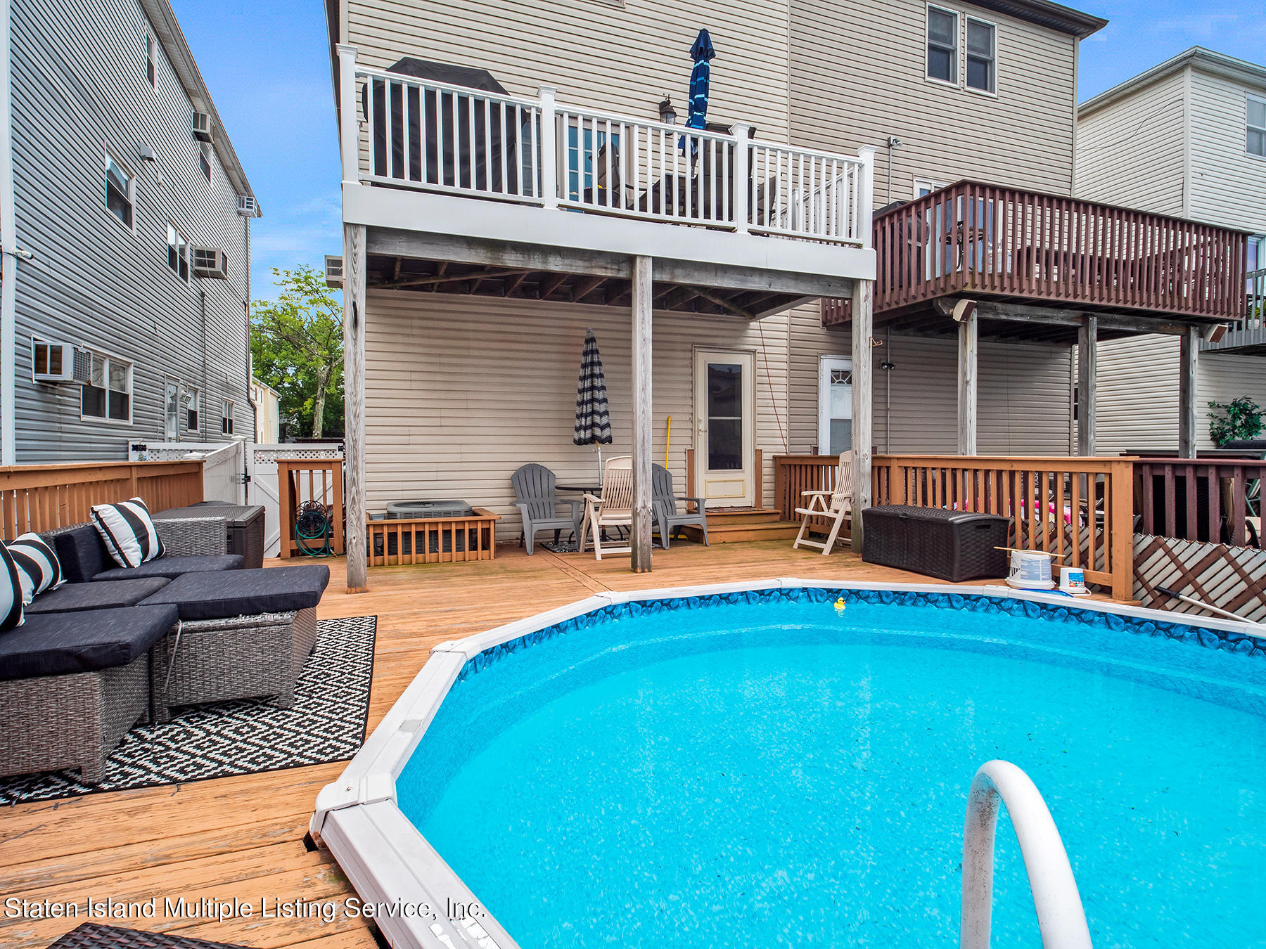 84 Stack Drive Staten Island, NY 10312 - Photo 29 of 29 a view of a house with pool and porch