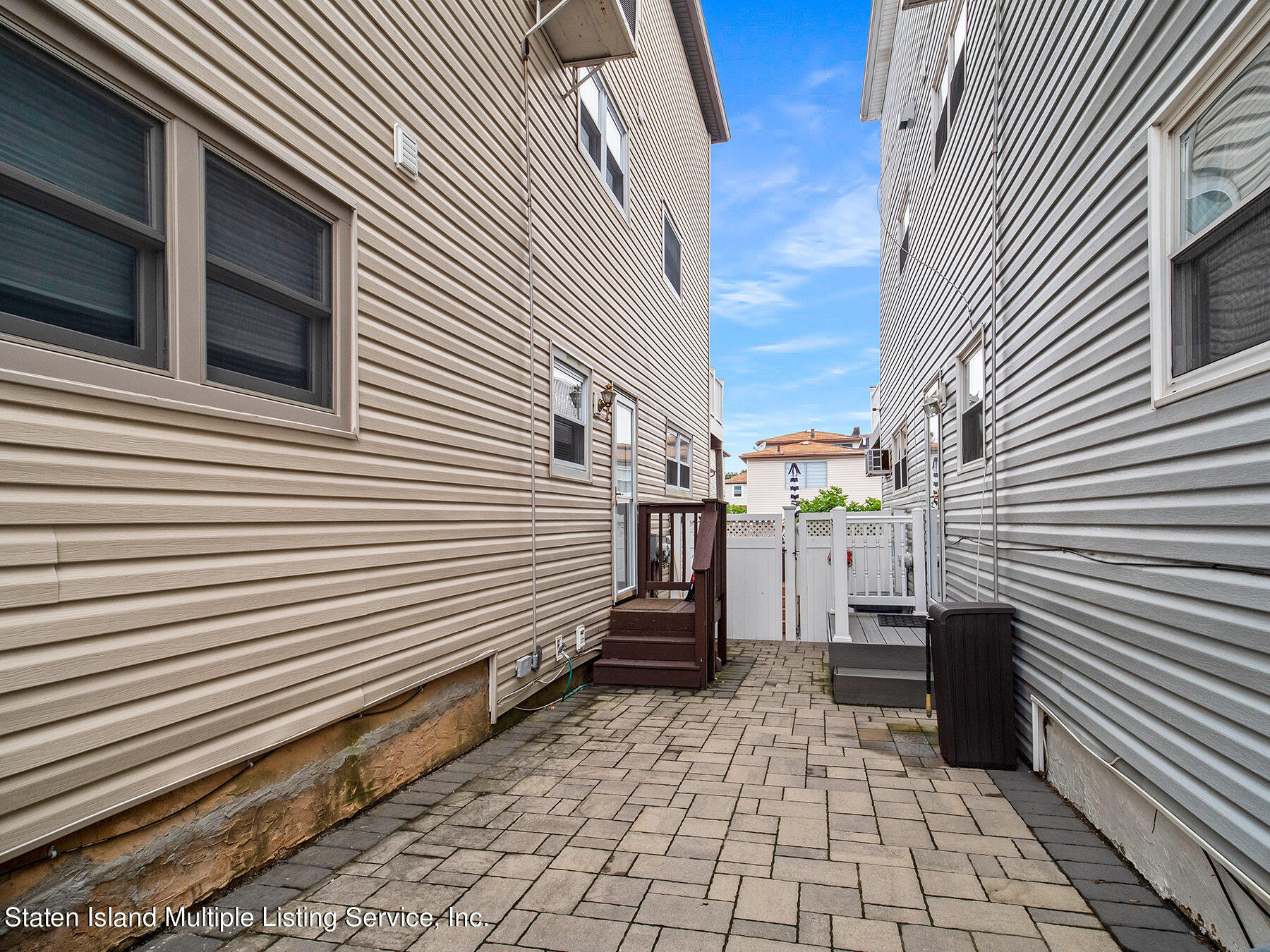 84 Stack Drive Staten Island, NY 10312 - Photo 5 of 29 a view of a back side of house
