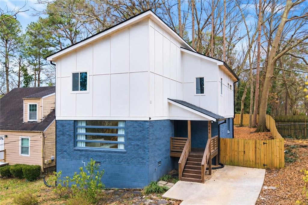1846 Rogers Avenue Southwest Atlanta, GA 30310 - Photo 1 of 46 a view of a house with a yard