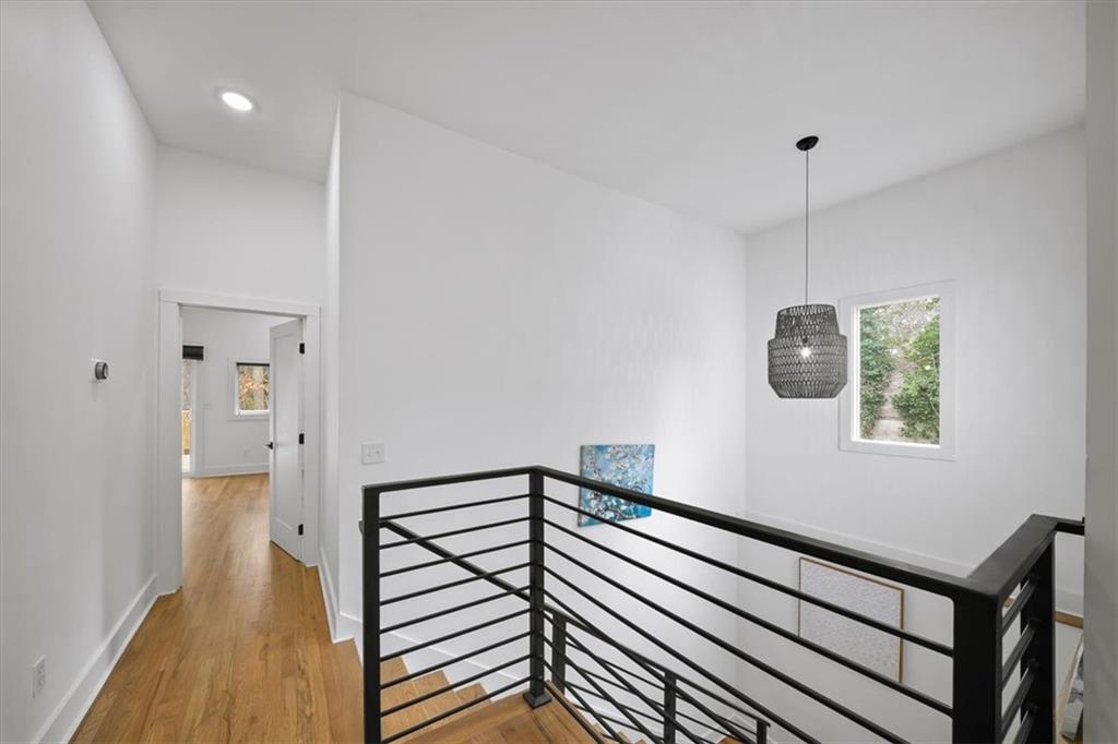 1846 Rogers Avenue Southwest Atlanta, GA 30310 - Photo 20 of 46 a view of a hallway with wooden floor and staircase