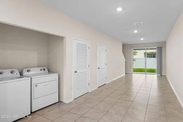 a view of utility room with washer and dryer