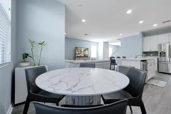a view of a dining room with furniture