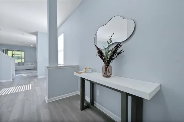 a view of livingroom with furniture and wooden floor