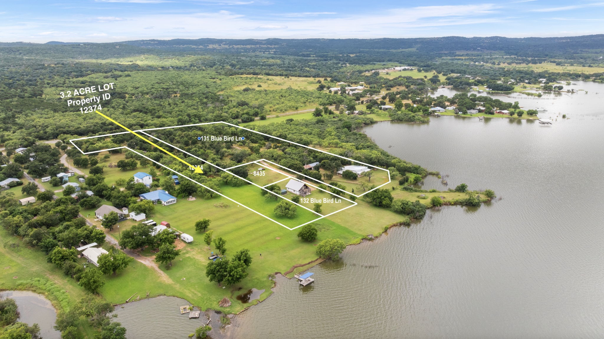 A lakeside property with lush green landscapes and expansive water views awaits.