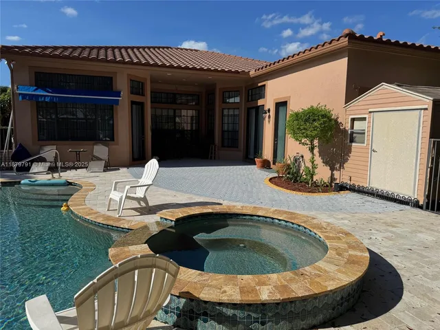 a living room filled with furniture and a table