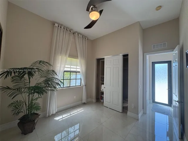 a view of swimming pool with a yard