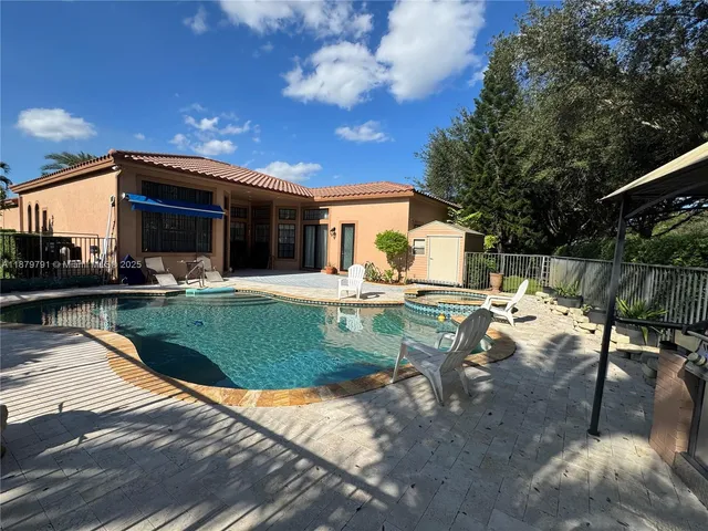 a view of a street with a building in the background