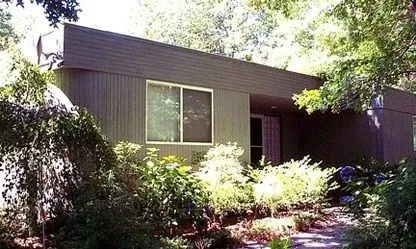 a view of house with flowers