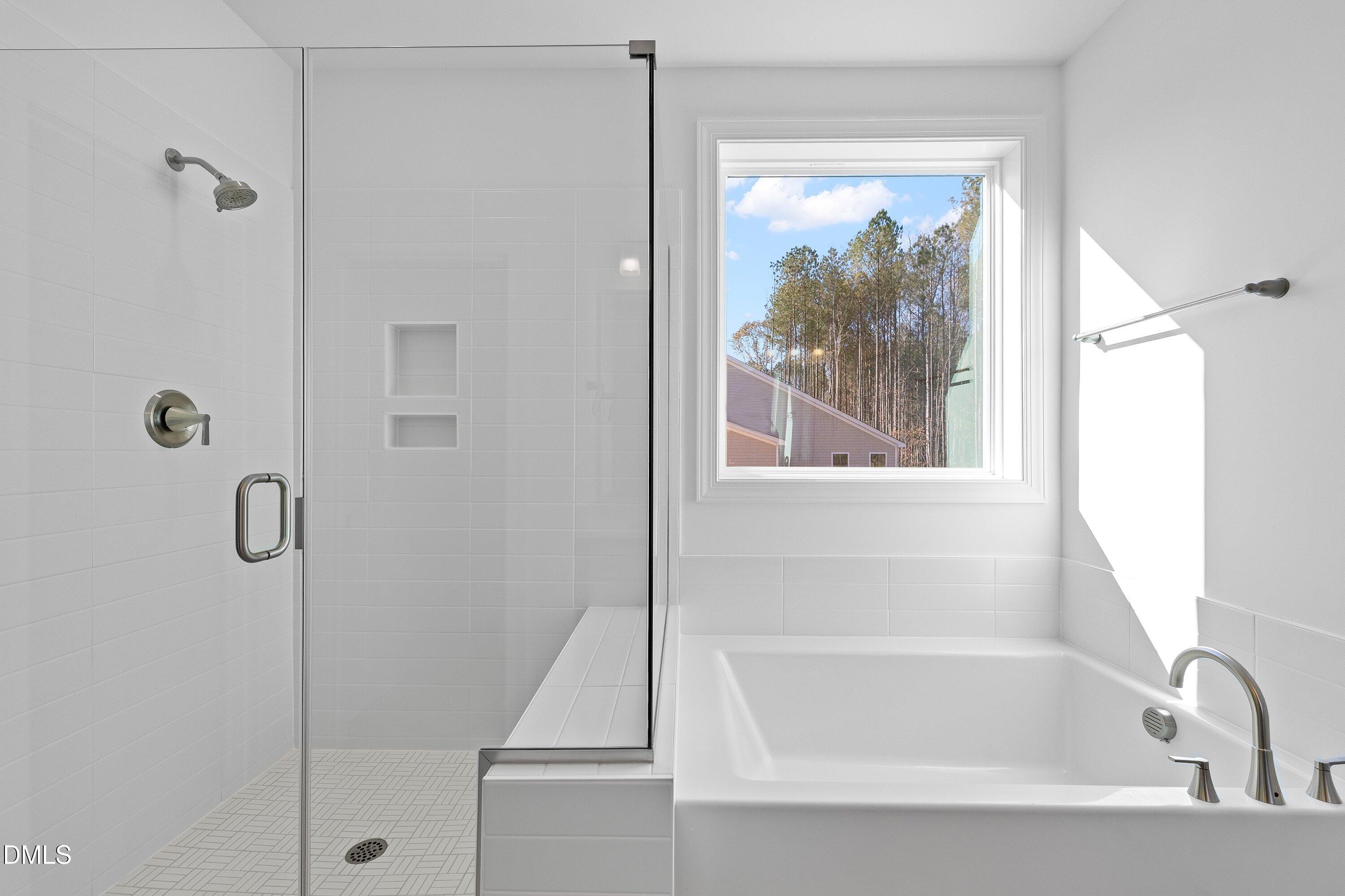 62 West Victoria Ridge Drive, Unit 19 Selma, NC 27576 - Photo 17 of 26 a bathroom with a tub
